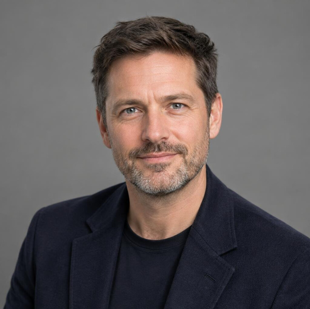 Studio portrait of a British male production director
