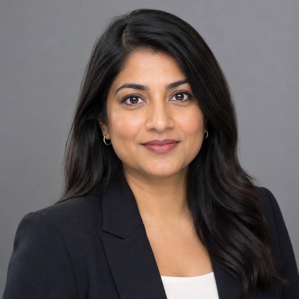 Studio portrait of a British-Indian delivery operations manager