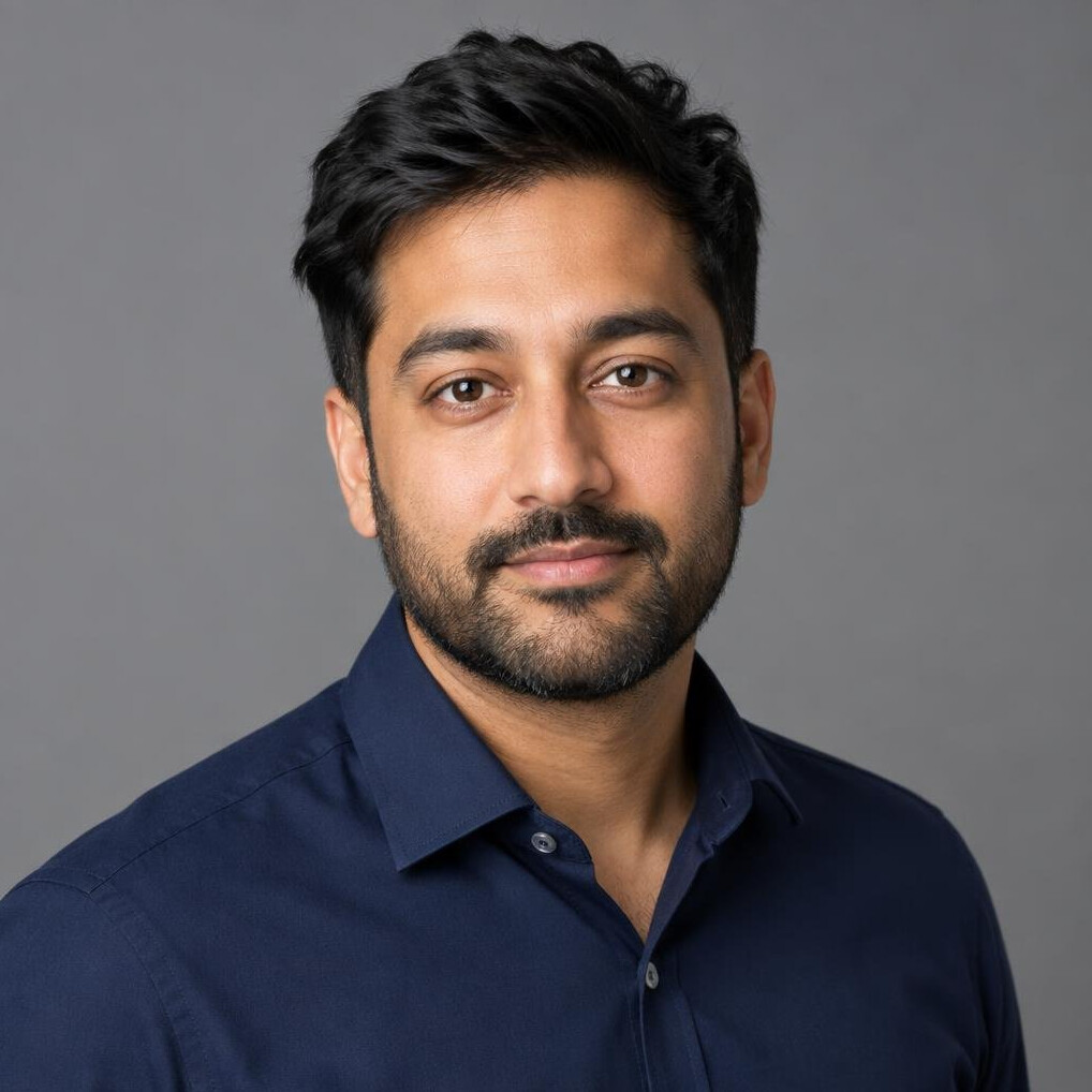 Studio portrait of a British-Asian lighting designer